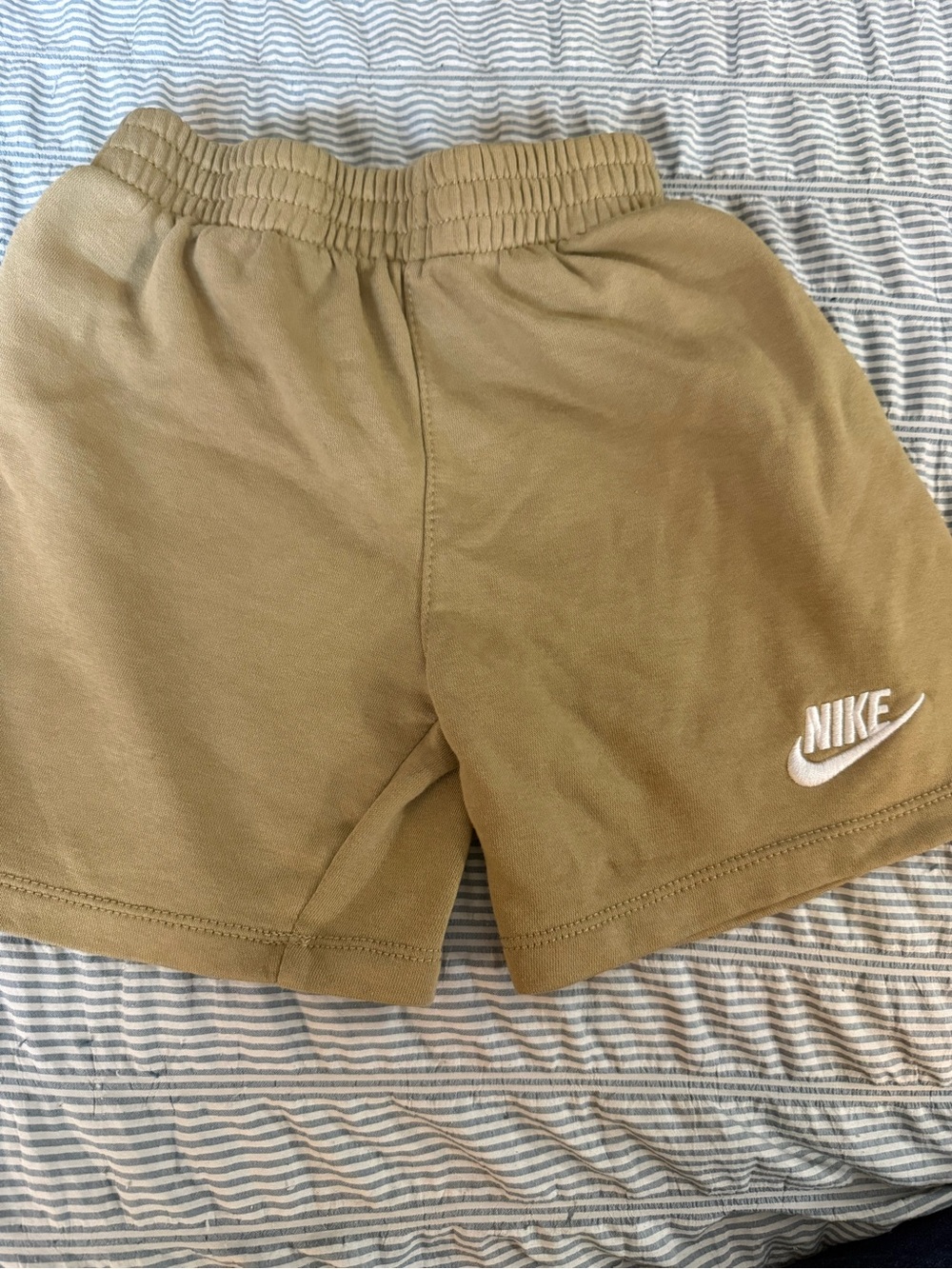 Nike Kids Tan Athletic Shorts with White Logo